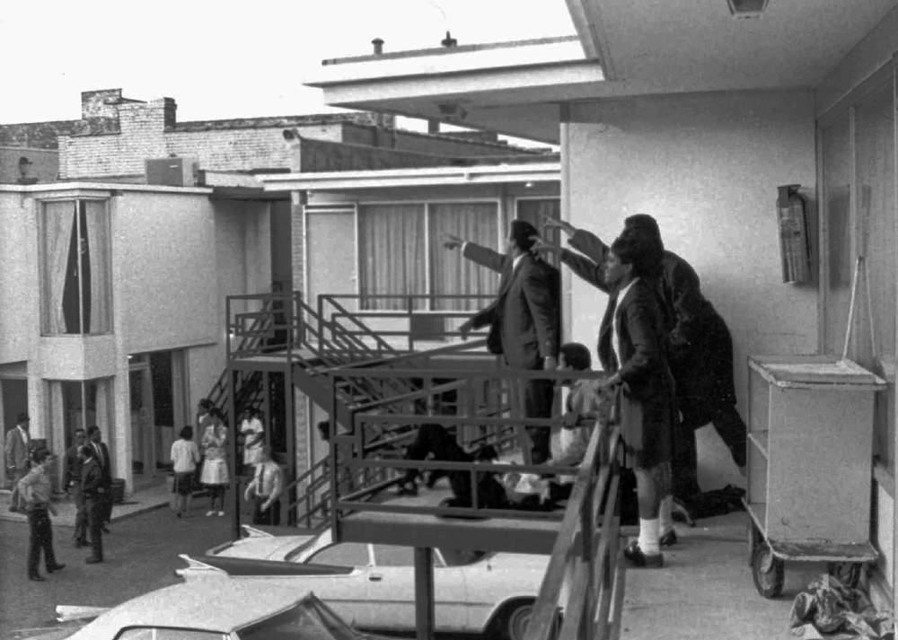 This 1968 photo was taken minutes after an assassin&#39;s bullet struck Dr. Martin Luther King Jr. at the Lorraine Motel in Memphis, Tenn., on April 4, 1968. According to the photographer, Joseph Louw, the men at right, several of Dr. King&#39;s aides, stand over King&#39;s body as they point out to police where they heard the shot. In the center of the photo is Andrew Young. AP Photo\/Files, Copyright 1968 Time Inc.
